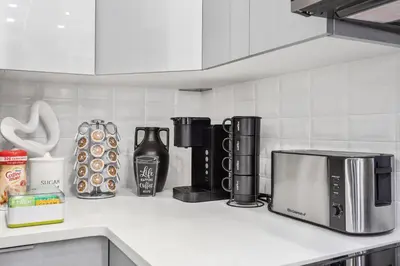 a kitchen counter with a coffee maker and a microwave at SWJ Whole Bldg - Largest Place in NYC_21 Beds_6 apts in New York