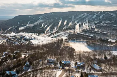 an aerial view of a village in the snow at Brentwood Burrow in East Stroudsburg