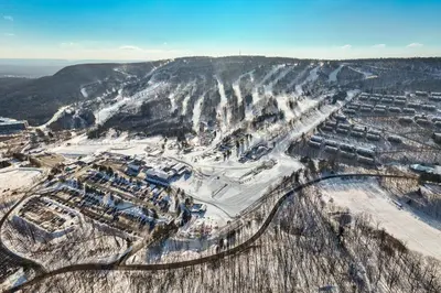 an aerial view of a city on a snowy mountain at Brentwood Burrow in East Stroudsburg