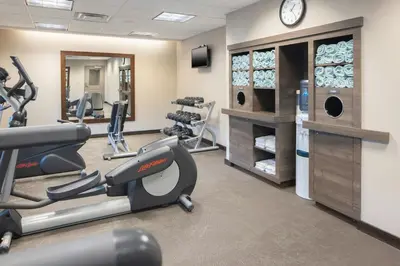 a fitness room with treadmills and cardio equipment at Residence Inn by Marriott Albany Clifton Park in Clifton Park