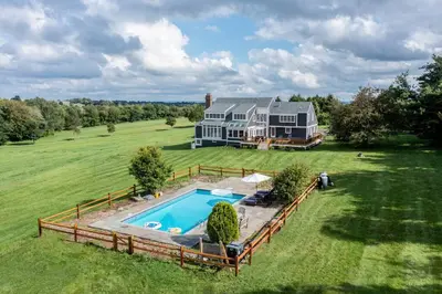 an aerial view of a large house with a swimming pool at Lakeview Expanse in Bethlehem