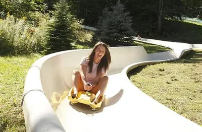 a woman sitting in a tub in a skate park at Must See Pirate Suite Ski On Off Jiminy - Mtn View Fully Redone Decor in Hancock