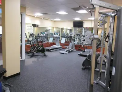 a gym with several treadmills and exercise bikes at Must See Pirate Suite Ski On Off Jiminy - Mtn View Fully Redone Decor in Hancock