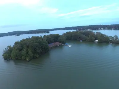 an island in the middle of a large body of water at Cabin Chalet - Breathtaking Cabin in Laurel Island in East Hampton