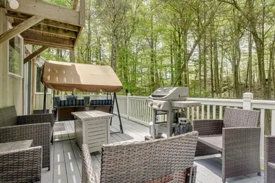 a grill on the deck of a house at South Salem Vacation Rental with Furnished Deck! in South Salem