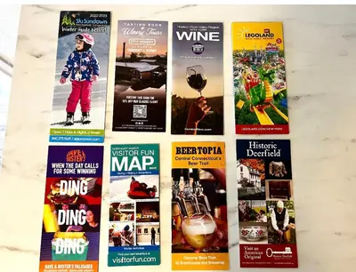 a bunch of books lined up on a table at 4-A Diamond in Yonkers in Yonkers