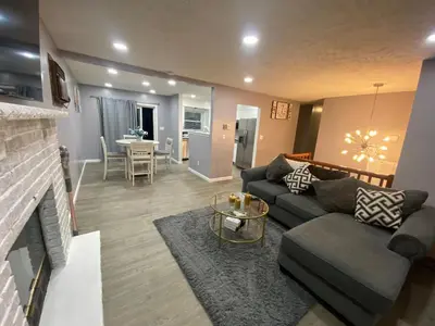 a living room with a couch and a fireplace at Home in Tobyhanna, Poconos Mountain, Pennsylvania in Tobyhanna