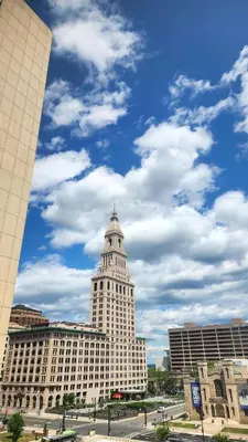a large white building with a tower on top of it at XL Center 1-BR Condo DWNTN Hartford Easy Parking in Hartford