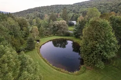 an overhead view of a pond on a golf course at Sunday Hollow in Margaretville