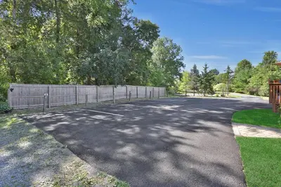 a road with a fence on the side of it at Moondance Ridge Suites in New Paltz