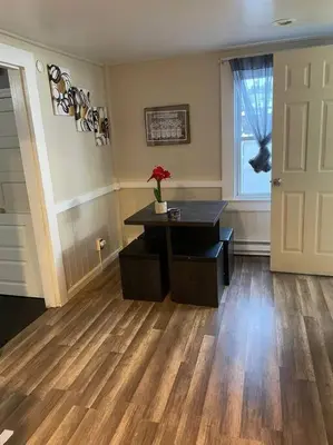 an empty room with a desk and a window at Comfortable home away from home in East Hartford