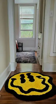 a yellow and black rug on the floor in a hallway at Modern 4BDRM West Hartford Home In Great Location! in West Hartford