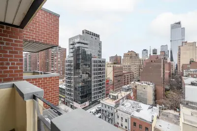 a view of the city from the balcony of a building at Eden, dream high-end home in NYC in New York