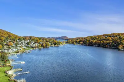 an aerial view of a river with boats at Candlewood Lake House in Danbury
