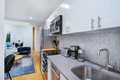 a kitchen with a sink and a counter top at 1290-8 New Renovated 2 Bedrooms in UES in New York