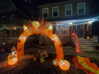 an orange pumpkin arch in front of a house at Lovely 2 bedroom Apartment with 2 Entrance and Parking with a fee in University Heights