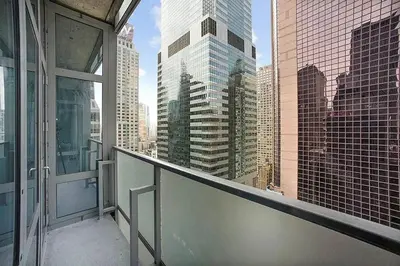 a balcony with a view of a city skyline at Times Square Penthouse in New York