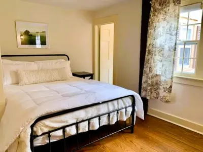 a bedroom with a bed and a window at INCREDIBLE Northern Westchester Historic Hideaway in South Salem