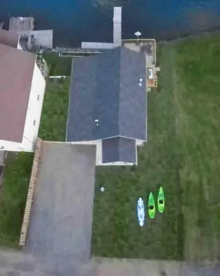 an aerial view of a yard with two green shoes at Madison Cabin #2 in Hamilton
