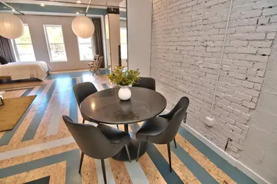 a dining room with a table and chairs at Wonder Loft A3 - Main St. Honesdale in Honesdale