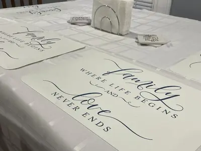 a table topped with white table cloth with signatures at Comfy 3 Bed 1 Bath with Wifi in College and Restaurant Area in Springfield