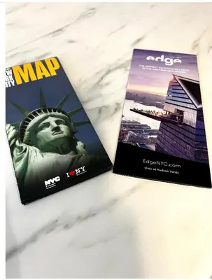 two magazines on a table with the statue of liberty at 6-A Diamond in Yonkers, NY in Yonkers