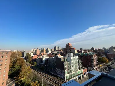 an aerial view of a city with buildings at Starlight Hotel Near LGA Airport in Queens