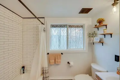 a bathroom with a shower and a toilet at Hunter Mountain Home with Game Room 1 Mi to Skiing! in Hunter