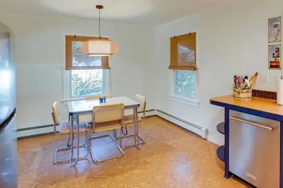 a kitchen with a table and chairs in a room at Windham Home Near Mountain Biking and Hiking Trails! in Windham