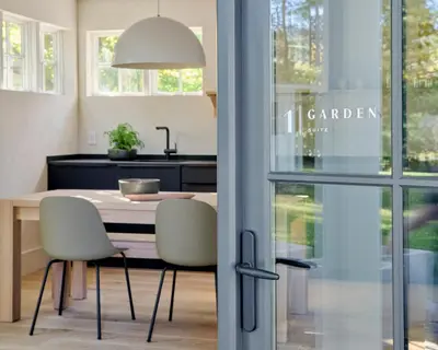 a kitchen and dining room with a table and chairs at 9 Academy in Salisbury