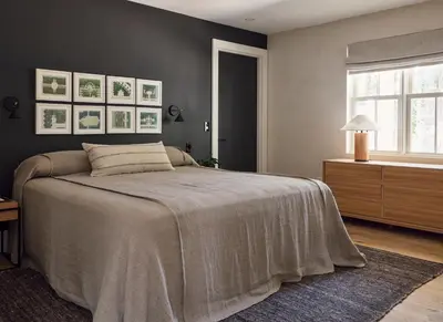 a bedroom with a large bed and a window at 9 Academy in Salisbury