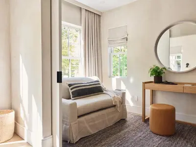 a bedroom with a bed and a mirror at 9 Academy in Salisbury