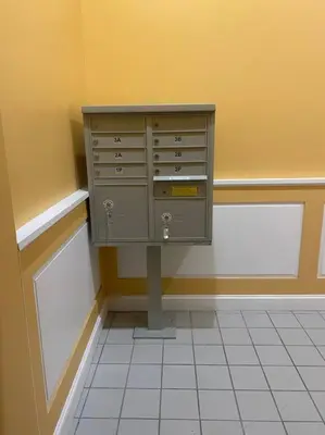 a cabinet in the corner of a room at Downtown Albany 2 Bedroom + Workstation @ The Mark in Albany