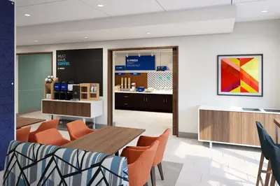a restaurant with a table and chairs and a counter at Holiday Inn Express & Suites Bronx - Zoo Area by IHG in Bronx