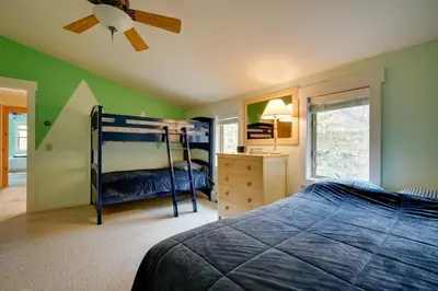 a bedroom with a bunk bed and a desk at West Dover Family Home with Game Room and Home Theater in West Dover