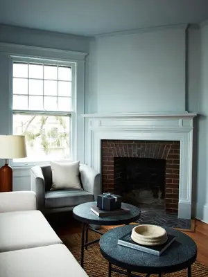 a living room with a couch and a fireplace at CoHouse New Haven steps to Yale University in New Haven