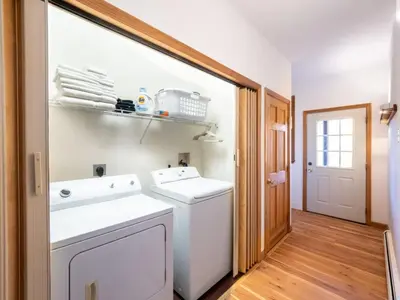 a laundry room with a washer and dryer at Private Berkshires Home On 5+ Acres Rustic & Chic in Otis