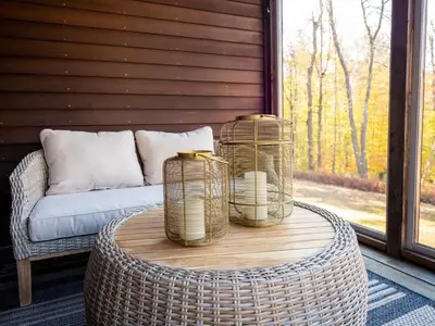 a wicker table with two baskets on top of it at Private Berkshires Home On 5+ Acres Rustic & Chic in Otis