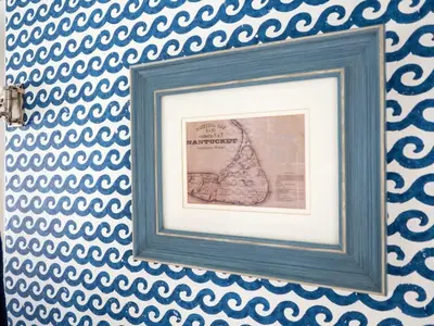 a picture in a frame on a blue and white wall at Berkshire Vacation Rental: Stockbridge Home Come Experience The Berkshires in Stockbridge