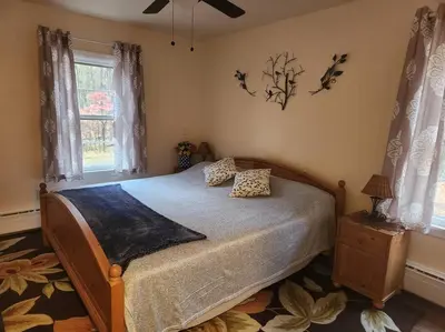 a bedroom with a bed with two pillows on it at Near Marist/Vassar/Culinary Inst./Historic Sites! in Pleasant Valley