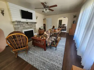 a living room with a couch and a fireplace at Near Marist/Vassar/Culinary Inst./Historic Sites! in Pleasant Valley
