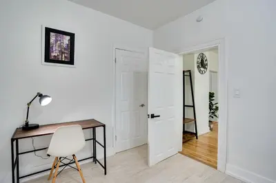 an office with a desk and a chair in a room at Modern Hastings-On-Hudson Home Near River! in Hastings-on-Hudson