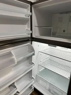 an empty refrigerator with its door open and its door at 2 KING Beds WD Parking Stylish GREAT VALUE in Schenectady