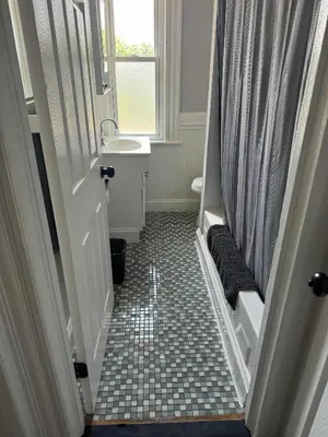 a bathroom with a sink and a shower curtain at Private Apt In Middletown-wesleyan in Middletown