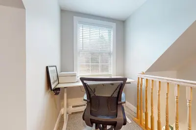 a home office with a desk and a chair at Modern Mountain Homestead in Dover