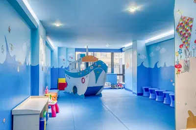a childrens room with a large blue room with a large boat mural at Upper West Side 2br w rooftop gym nr park NYC-1216 in New York