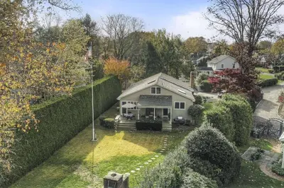 an aerial view of a house with a fence at Luke's Landing in Westport