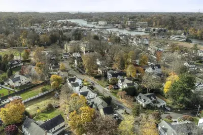 an aerial view of a small town with houses at Luke's Landing in Westport