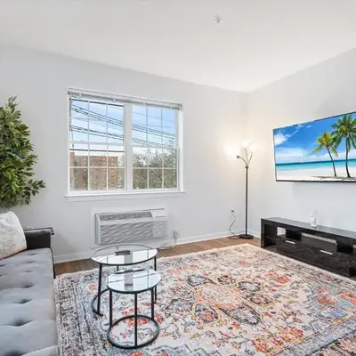 Modern 2BR 2BA Condo Sleeps 8 with Gym Laundry 20 Min to NYC