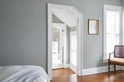 a bedroom with a mirror and a chair at The Kent Collection - The Victorian in Kent
